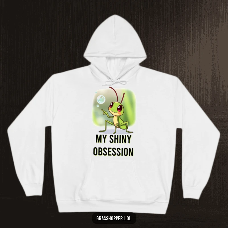 Funny excited grasshopper hoodie, pointing towards a sparkling dewdrop, ideal for cozy exploration, a funny gift.