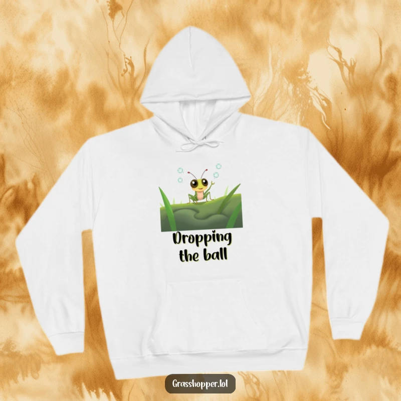 Funny grasshopper with bulging eyes attempting to juggle shining dewdrops, depicted on a soft and warm hoodie.