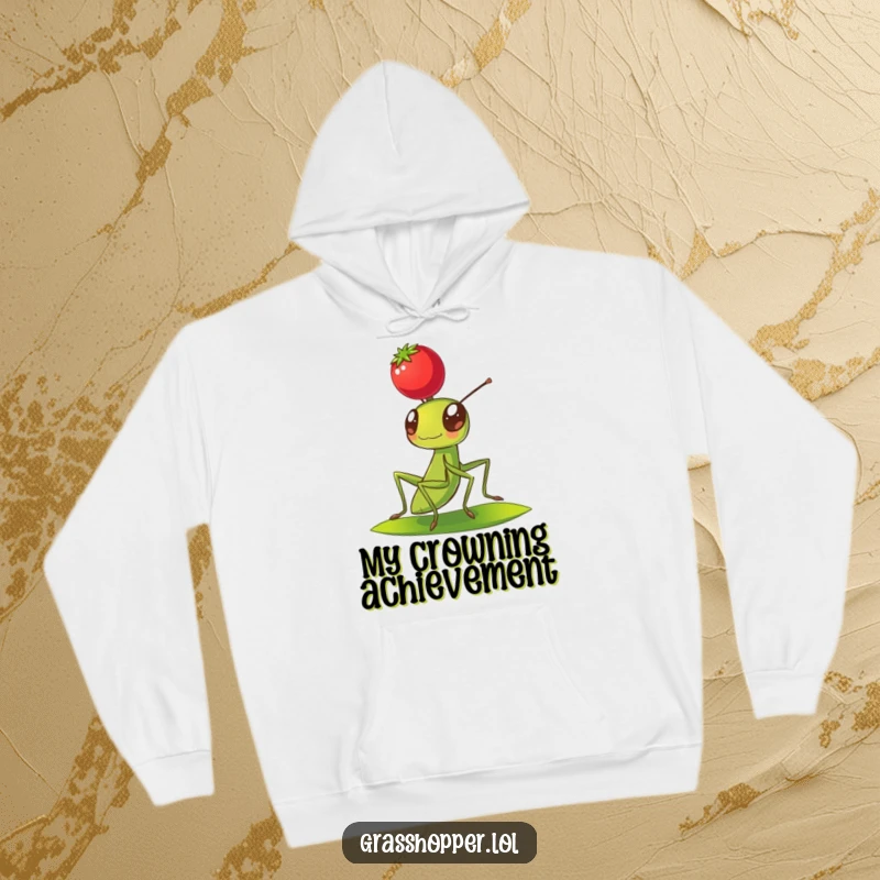 Funny Grasshopper Hoodie showing a grasshopper balancing a bright red berry on its head, perfect for cozy days.