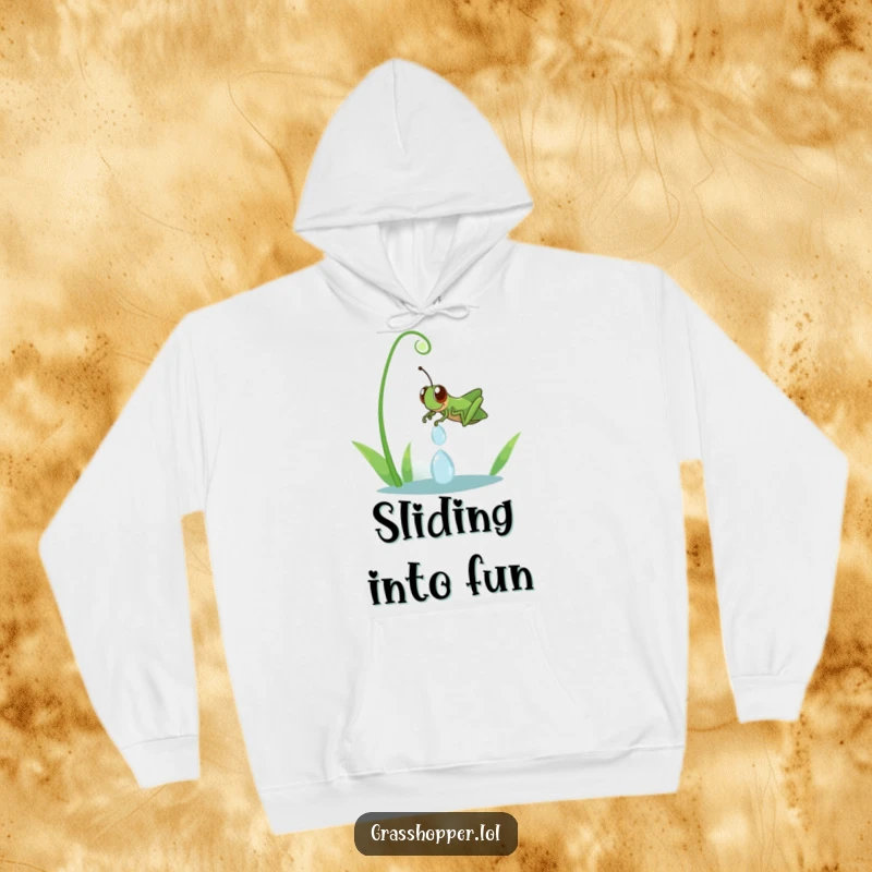 Funny grasshopper mid-slide down a glistening dewdrop, depicted on a soft hoodie, creating a joyful and humorous visual.