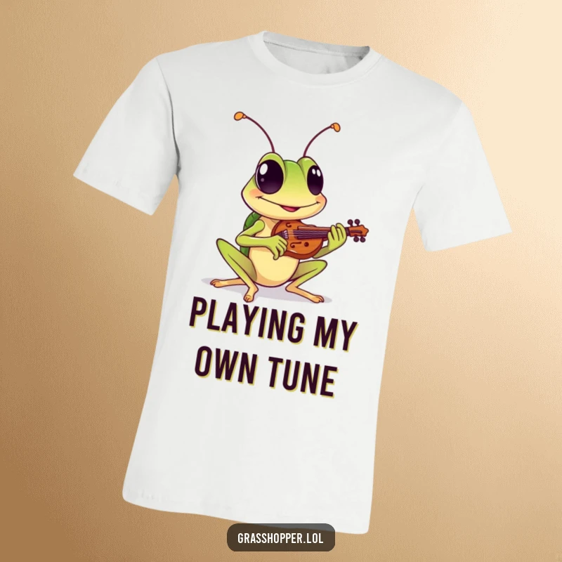 Funny t-shirt depicting a grasshopper with a wide, cheerful grin playing a tiny violin, perfect for music lovers and funny gift seekers.